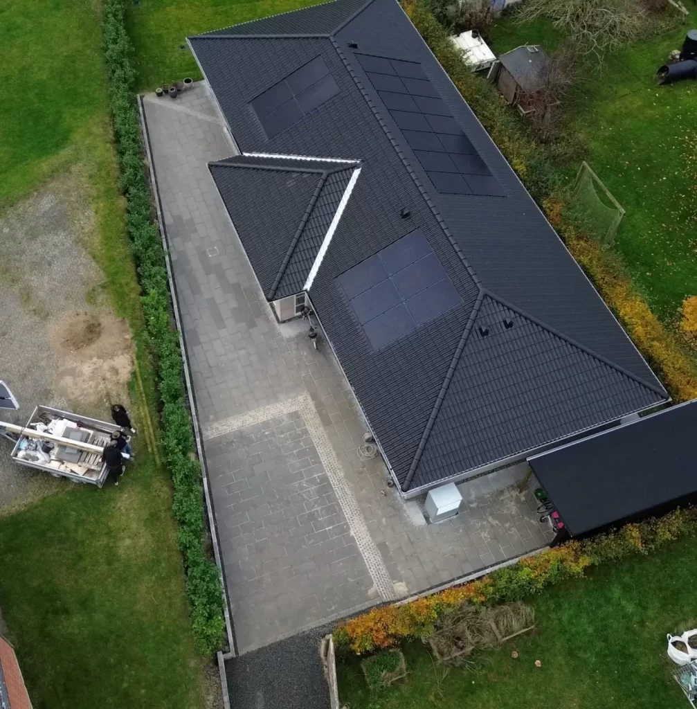 Anlæg af have til nybyggeri med terrasse, belægning og græs som samlet løsning